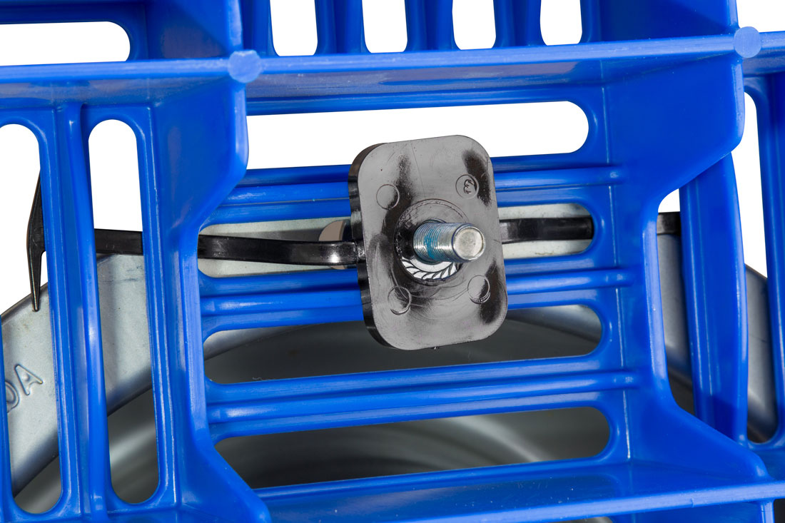 The Hog Slat flooring fastener features a bolt nut encased in a plastic square with tabs. The nut assembly slides between the floor openings and can be adjusted with the tabs that keep it from falling through the floor. The bolt assembly can then be attached for secure placement of an AquaBowl or other equipment. The plastic tabs can be cut off after installation.